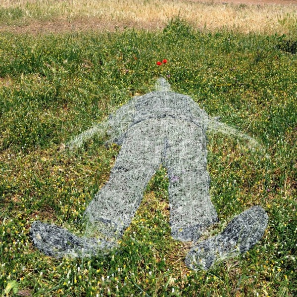 4386892-human-figure-imprinted-on-grass